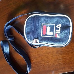 FILA Mens. VTG. in PVC. A Classic Style. EUC